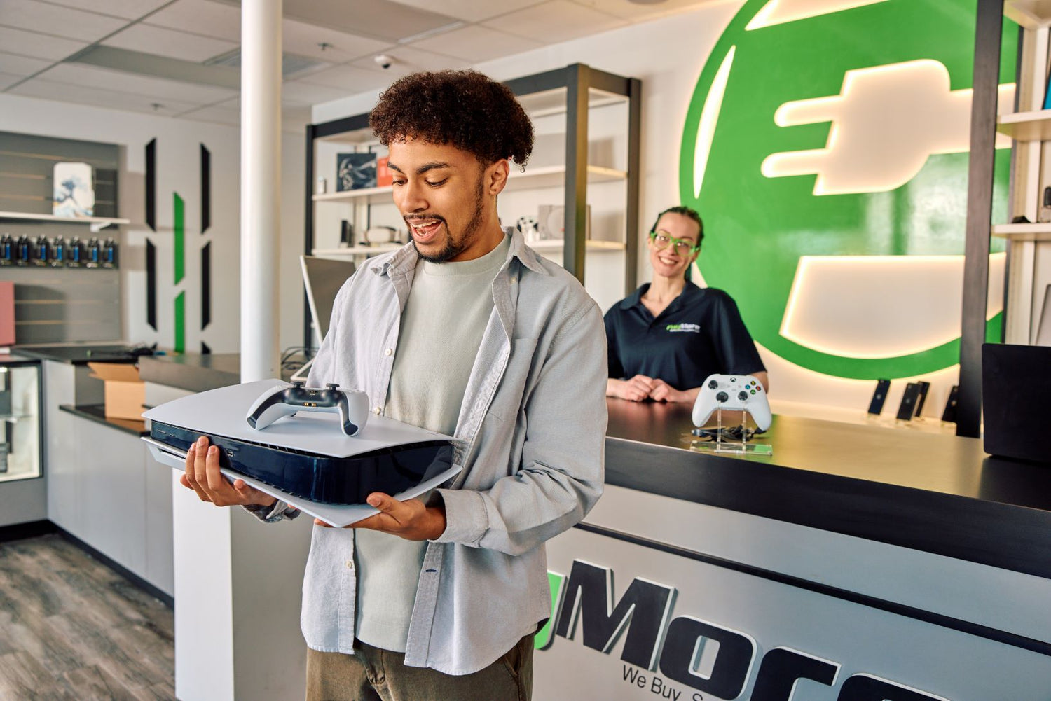 customer smiling after purchasing a gaming console